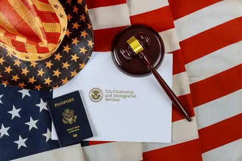 american flag, gavel, passport, and document