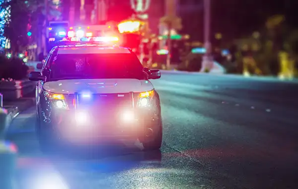 A cop who's pulled over a man driving drunk