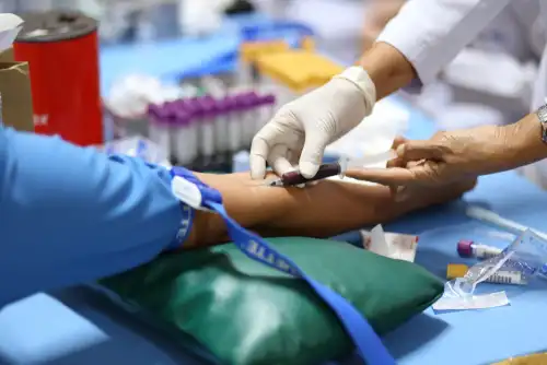 person having blood drawn