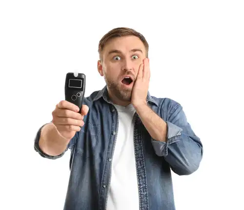 Man with Breathalyzer 