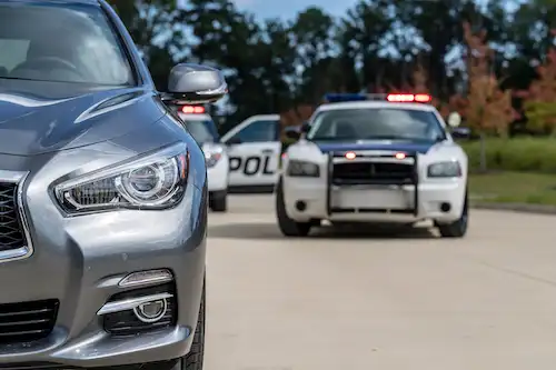 Police pulling over drunk driver